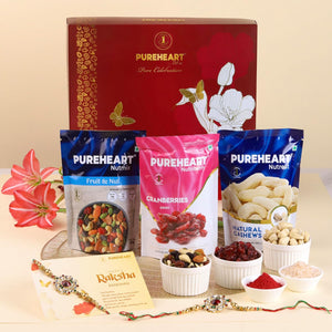 PUREHEART Rakhi Gift Hamper- Natural Cashews, Fruit & Nut Nutmix and Cranberries(80g, each) with Floral Rakhi for Brother, Gift Card, Pooja Rice, Kumkum - Crunchy Dry Fruits and Nuts