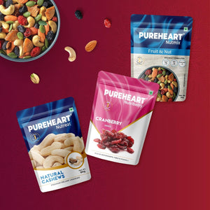 PUREHEART Rakhi Gift Hamper- Natural Cashews, Fruit & Nut Nutmix and Cranberries(80g, each) with Floral Rakhi for Brother, Gift Card, Pooja Rice, Kumkum - Crunchy Dry Fruits and Nuts
