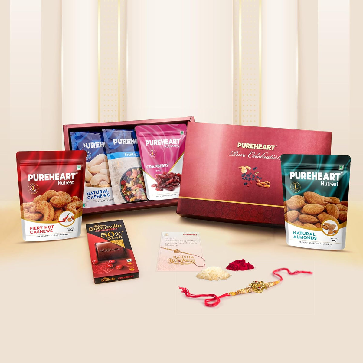 PUREHEART Rakhi Gift Hamper - Natural and Fieryhot Cashews, Almonds, Fruit & Nut Nutmix, Cranberries (80 g, each), Dark Chocolate with Rakhi for Brother, Card, Rice, Kumkum