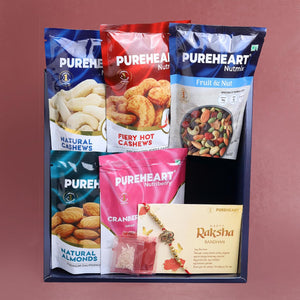 PUREHEART Rakhi Gift Hamper - Natural and Fieryhot Cashews, Almonds, Fruit & Nut Nutmix, Cranberries (80 g, each), Dark Chocolate with Rakhi for Brother, Card, Rice, Kumkum