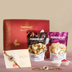PUREHEART Rakhi Gift Hamper - Salted Cashews, Pepperfry Cashews (80g, each) with Floral Rakhi for Brother, Gift Card, Pooja Rice, Kumkum