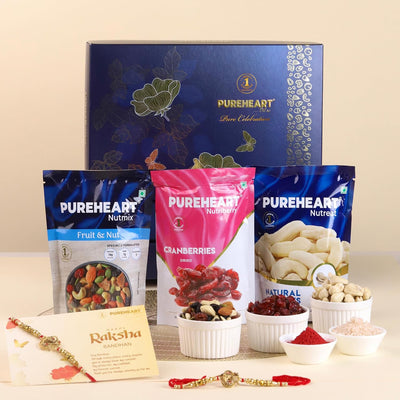 PUREHEART Rakhi Gift Hamper- Natural Cashews, Fruit & Nut Nutmix and Cranberries(80g, each) with Designer Rakhi for Brother, Gift Card, Pooja Rice, Kumkum - Crunchy Dry Fruits and Nuts