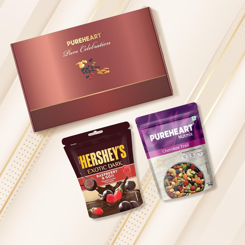PUREHEART Pure Celebration Rakhi Gift Hamper - Cherokee Trail Mix (80 g) & Hershey's Kisses Chocolate with Beautiful Ganpati Rakhi for Brother, Gift Card, Pooja Rice, Kumkum, Premium Dry Fruits Gift